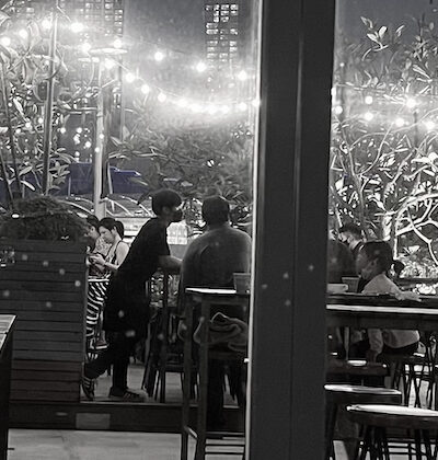 monochromatic image of a restaurant at night